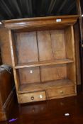 A modern stained pine composite wall shelf with drawers, w 60cm