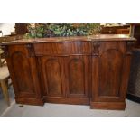 A Victorian mahogany sideboard having shaped front , width approx. 153cm