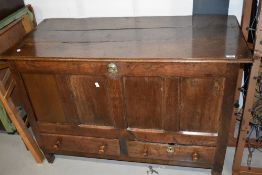 An 18th century mule chest having drawer base, with incised TW and dated 1736, w 121cm, h 76cm,