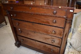 A Victorian mahogany Scotch chest of one frieze, and four long graduated drawers flanked by pillars,