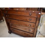 A Victorian mahogany Scotch chest of one frieze, and four long graduated drawers flanked by pillars,