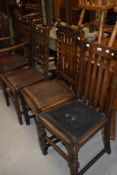 A set of 4 (3+1), early 20th century oak slat back dining chairs on bobbin legs, and a similar