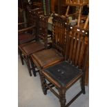 A set of 4 (3+1), early 20th century oak slat back dining chairs on bobbin legs, and a similar