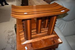A pagoda style stool, mixed woods