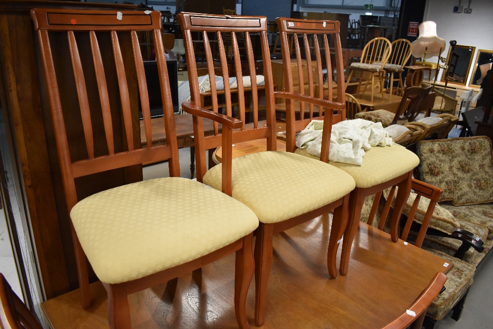 A late 20th century set of 6 (5+1) slat back dining chairs having primrose upholstery