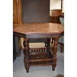 A late Victorian mahogany occasional/centre table having octagonal top with gallery undertier, w