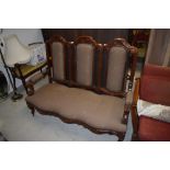 A Victorian style triple back settee having mahogany frame and modern upholstery, width approx.