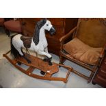 A traditional style child's rocking/pull along toy horse