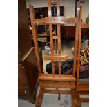 A top quality Victorian adjustable golden oak easel , labelled J Bryce Smith, London (would