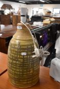 A mid century studio pottery table lamp, stamped Iden, Sussex Rye apprx 60cm tall