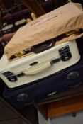 A vintage Revelation re-inforced fibreglass vanity case ands a busiess class case by Tula, etc