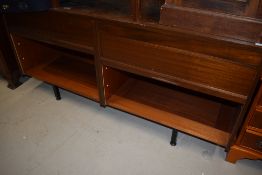 A vintage sapele sideboard (office or living) having tambour doors, width approx 153cm