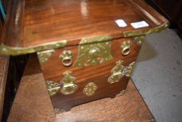 An oriental storage box , jewellery or similar with brass embellishments