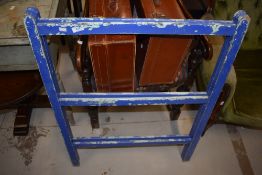 A vintage painted folding clothes horse