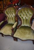 Two Victorian ladies and gents spoonback armchairs having scroll frames and knurl legs