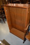 A modern teak effect adjustable bookcase, w 78cm