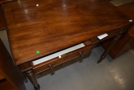 A 19th Century mahogany side/sofa table having double frieze drawers and drop flap ends, stamped