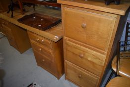 A Scandinavian home office desk and filing cabinet, by Treske , in golden oak finish