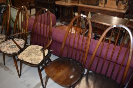 A set of five (four plus one) hoop and stick back kitchen chairs, labelled Ercol