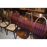 A set of five (four plus one) hoop and stick back kitchen chairs, labelled Ercol