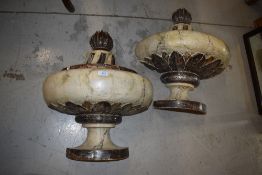 A pair of oversized wall sconces