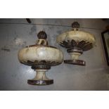 A pair of oversized wall sconces