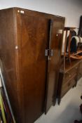 A 1930's oak Fitbrobe compactum wardrobe, reg des 796632, w 90cm