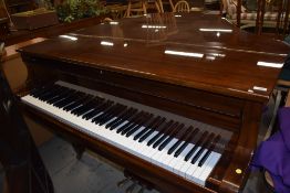 A Young Chang grand piano with suppliers stamp for Rumbelows of Reading