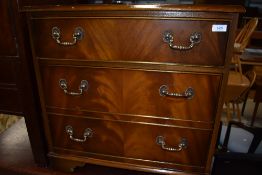 A late 20th century reproduction mahogany music cabinet with fall 'drawer' front, w 63cm20-30