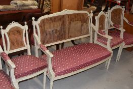 A period style salon suite comprising settee, two arm chairs and two standard chairs