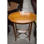 An Edwardian design satinwood occasional table having oval inlaid top and undertier, w 60cm