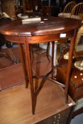 An Edwardian occasional table having shaped top with line inlay decoration, w 54cm