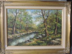 An oil painting, BLT, woodland landscape, indistinctly signed, 38 x 48cm, plus frame