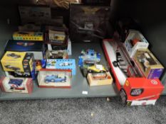 A shelf of modern diecasts including a Corgi 1:144 scale Classic Propliners Boeing Stratocruiser,
