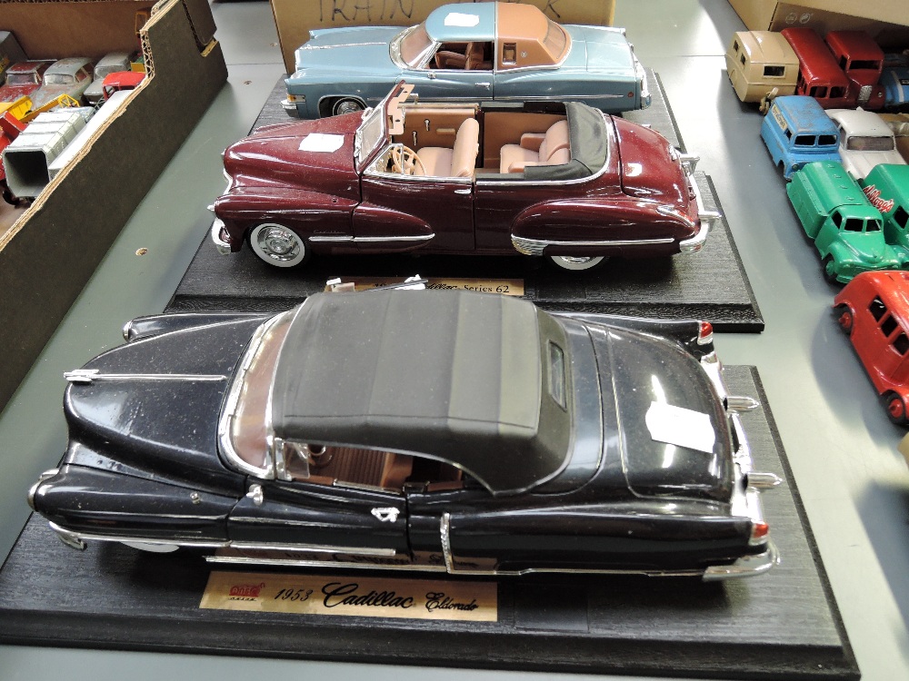 Three Anson 1:18 scale diecasts, 1953 Cadillac Eldorado, 1947 Cadillac Series 62 and 1973 Cadillac