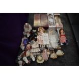A shelf of modern Collectors Dolls and Clowns including Leonardo, Alberon, Victoria, some boxed (