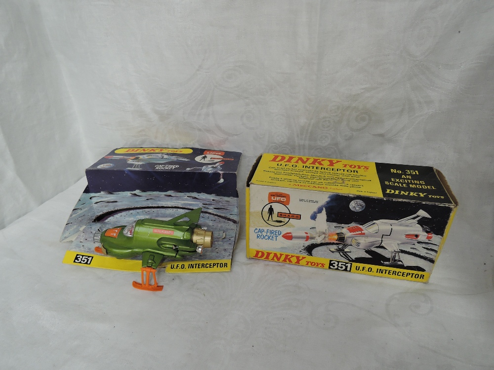 A Dinky diecast, Shado UFO Interceptor with rocket present, on inner card display stand, in original