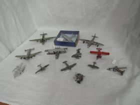 Twelve Pre War Dinky Diecast Aeroplanes including USA NC16736, G-A ZCA, G-A TBK, G-A DUV, Bi-Plane