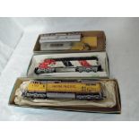Three Atlas and similar HO scale, Santa Fe Locomotives 5700 & 271C and Union Pacific 9703, all in
