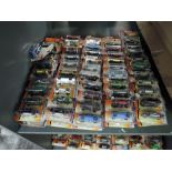 A shelf of modern Matcbox diecasts, all in blister packs, 100 in total