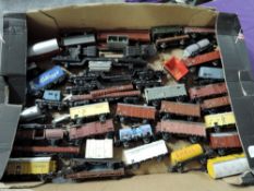 A box containing Thirty Four Marklin HO scale Wagons & Trucks including four rare 12 Wheel Bolsters