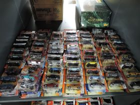 A shelf of modern Matchbox diecasts, all in blister packs, 140 in total