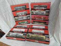 Fourteen Atlas HO scale items of rolling stock, ACF 23500 Gallon Tank Cars x4, ACF Kaolin Tank