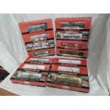 Fourteen Atlas HO scale items of rolling stock, ACF 23500 Gallon Tank Cars x4, ACF Kaolin Tank