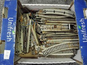 A box of Marklin HO scale Track including Points etc