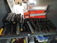 A shelf of 00 gauge Locomotives, Locos & Tenders, Rolling Stock etc including Lima, Hornby,