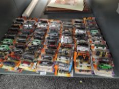 A shelf of modern Matcbox diecasts, all in blister packs, 140 in total