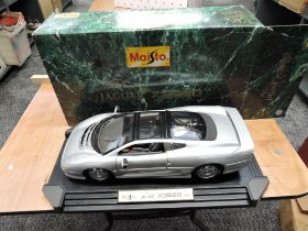 A Maisto 1:12 scale diecast model, Jaguar XJ220, boxed