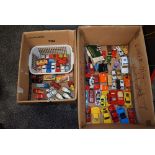 Two boxes of Matchbox, Corgi and similar mixed scale playworn diecasts including Matchbox