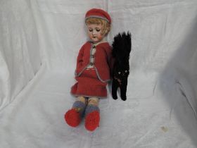 A late 19th/early 20th century Armand Marseille bisque headed doll 390-5 having sleep brown eyes,